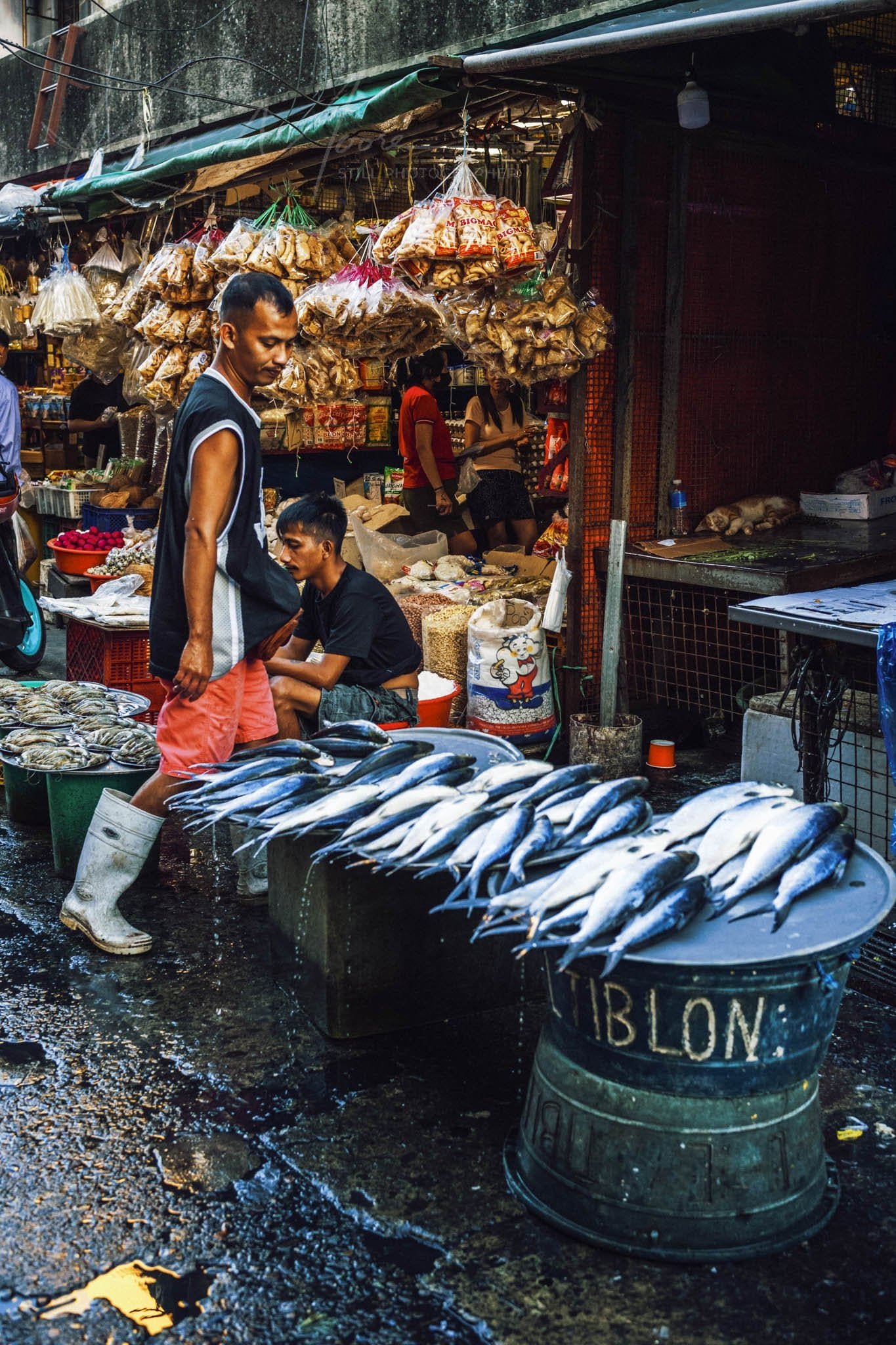 Vibrant Philippines market with fresh seafood and bustling local commerce.